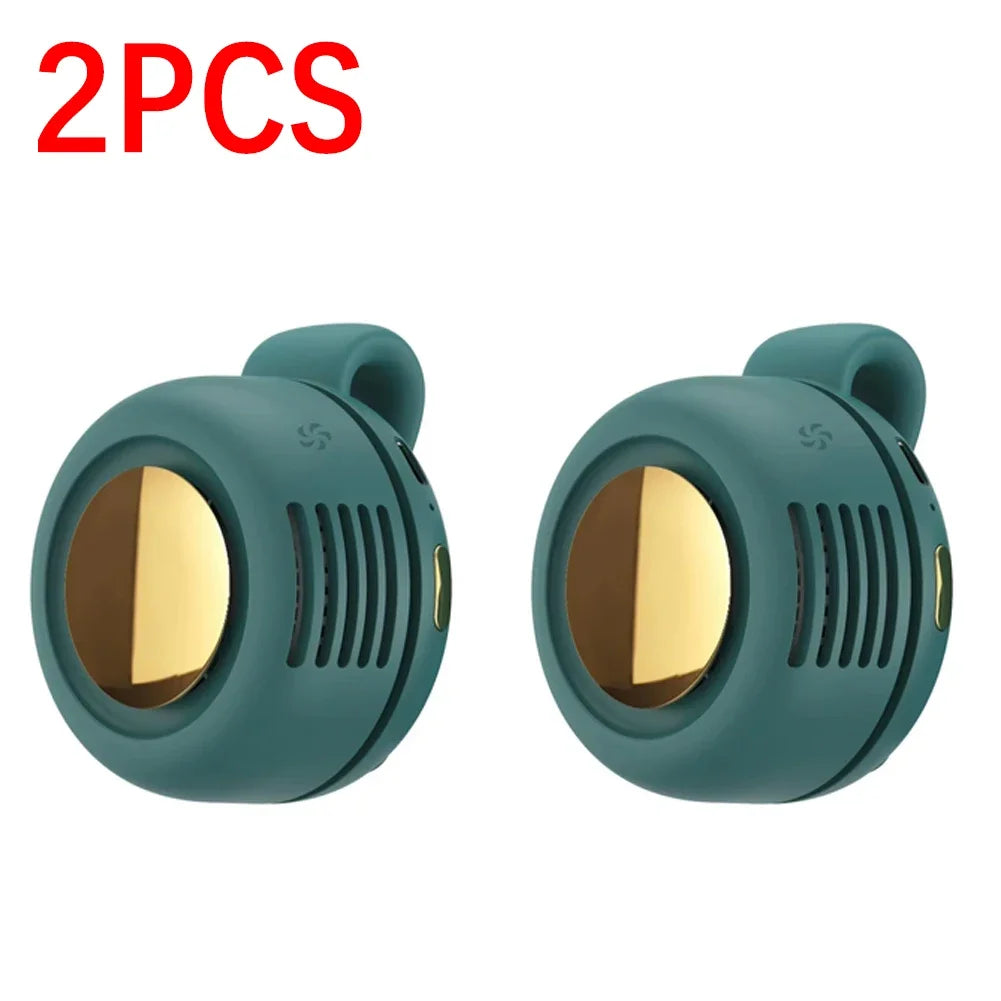 Two teal portable mini blade-less electric fans shown side by side.