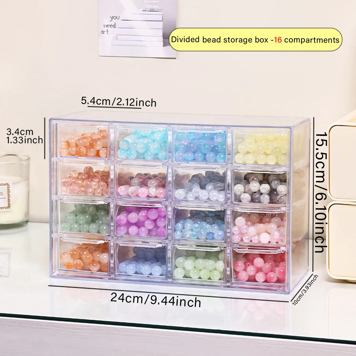 Acrylic transparent bead storage box with 16 divided compartments showing various colored beads.