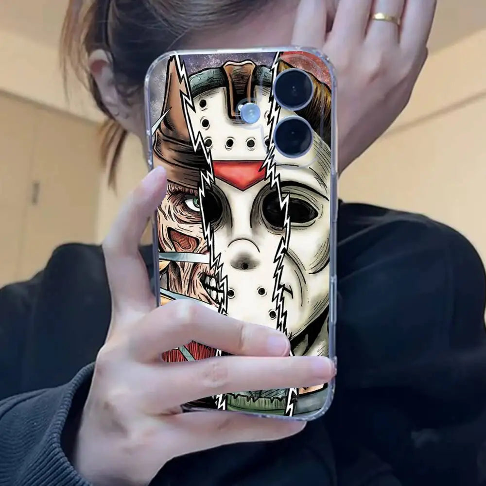 A hand holds a clear iPhone case featuring a Michael Myers horror design with a mask and lightning effects.