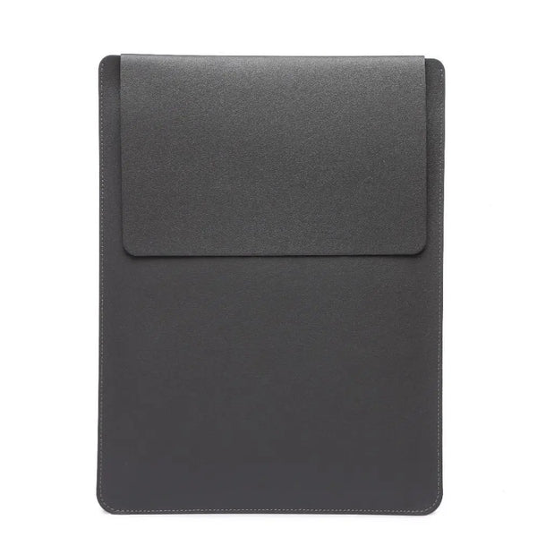 A dark gray slim laptop sleeve designed to protect tablets and devices.
