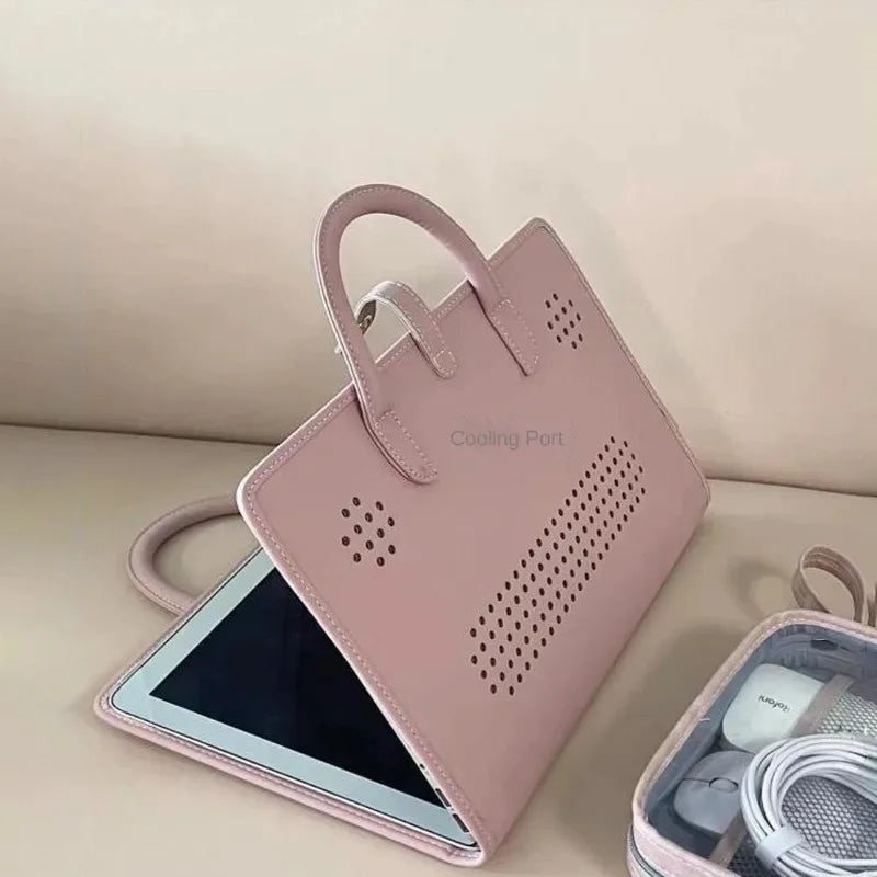 A pink laptop sleeve with a handle and protective PU case is shown next to a laptop.