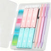 A clear plastic case holding a set of pink and purple mechanical pencils with refills and erasers.