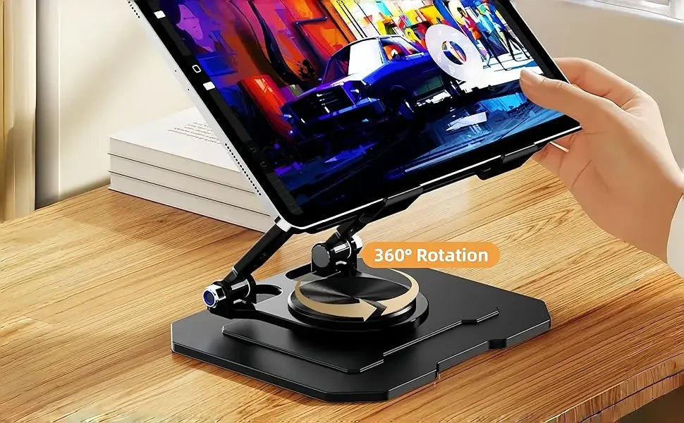 A hand holds a tablet displaying a colorful scene, resting on a black adjustable dual rod stand.