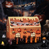 A box of vintage gothic Halloween masking tape featuring bats and jack-o'-lanterns for crafting.