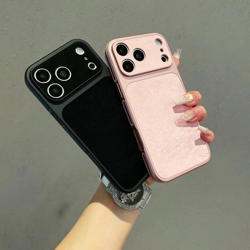 A hand holds a pink frosted velvet texture phone case with shockproof protection and a black phone.