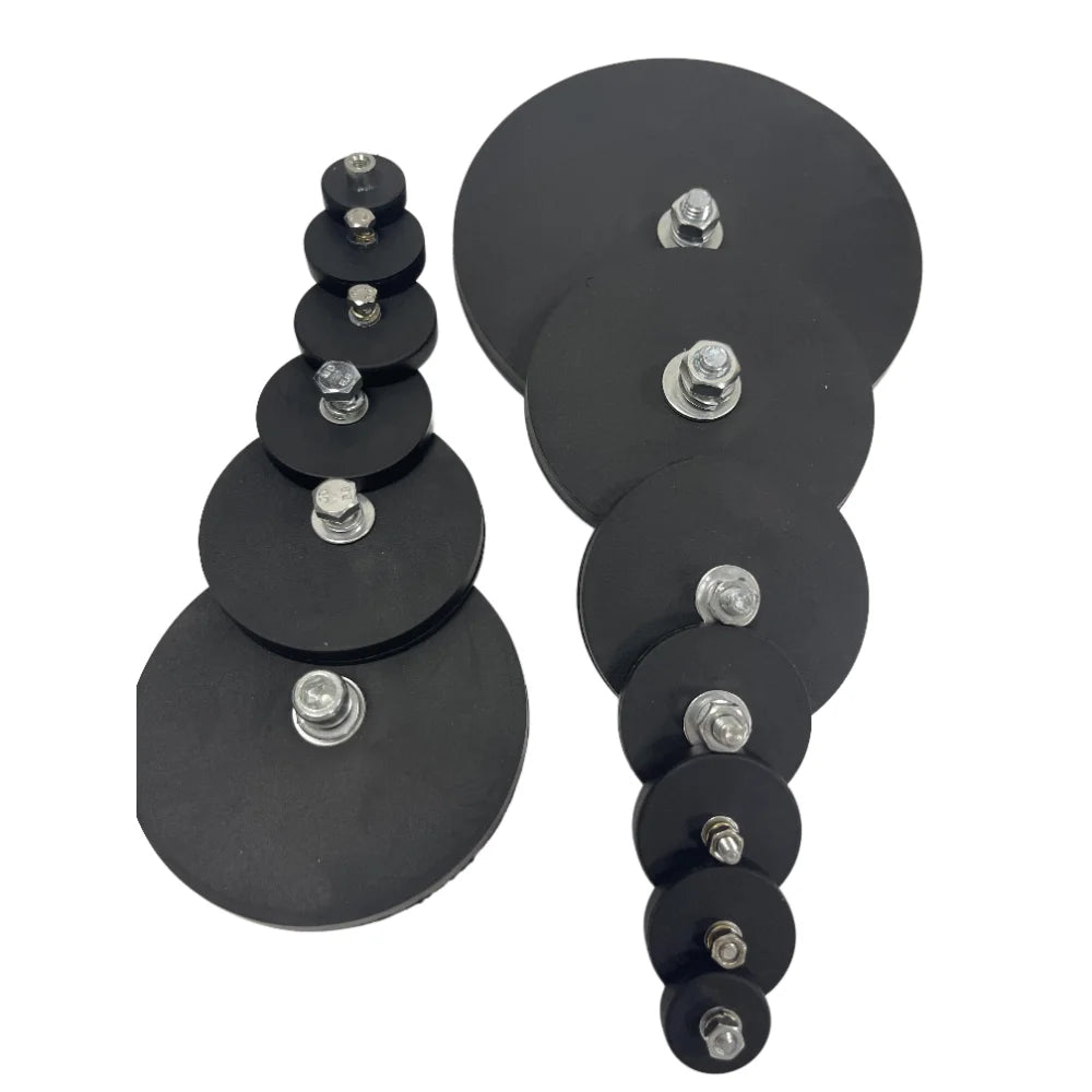 A stack of black magnetic base mount brackets for LED lights, showing various sizes and mounting hardware.