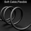 A close-up view of black, flexible soft cable coils.