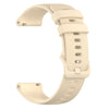 A beige silicone watch band for a smartwatch, shown from the side.
