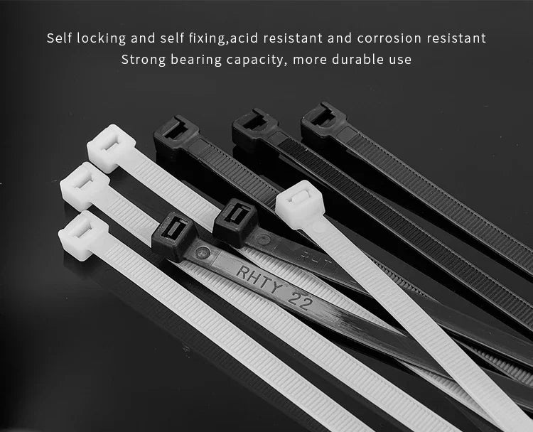 A collection of black and white heavy-duty nylon cable ties with self-locking designs shown diagonally.