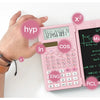 Hands are operating a pink scientific calculator with a built-in notepad, demonstrating its 240 functions.