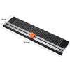 A black portable manual paper trimmer with a transparent guide and an orange cutting mechanism.