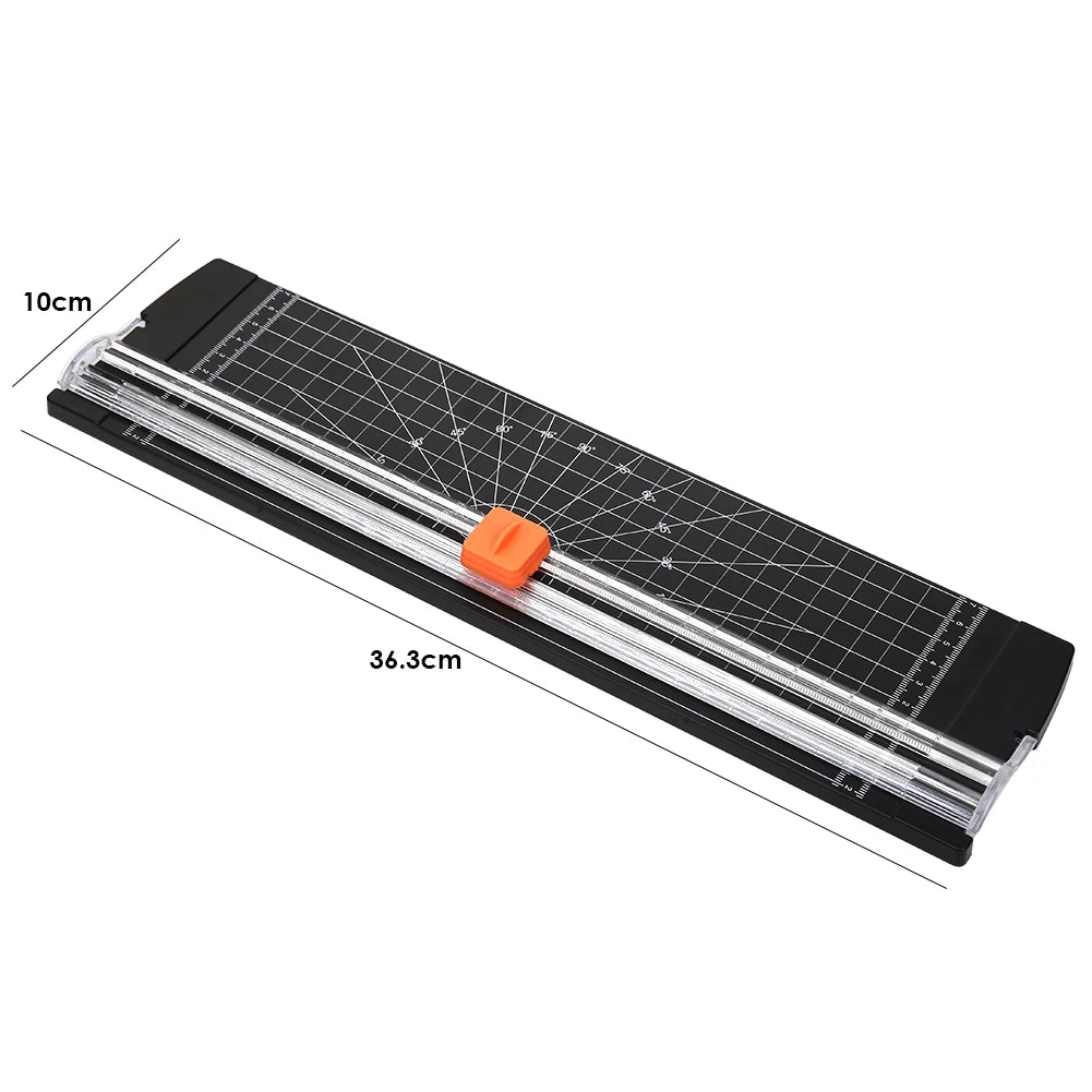 A black portable manual paper trimmer with a transparent guide and an orange cutting mechanism.
