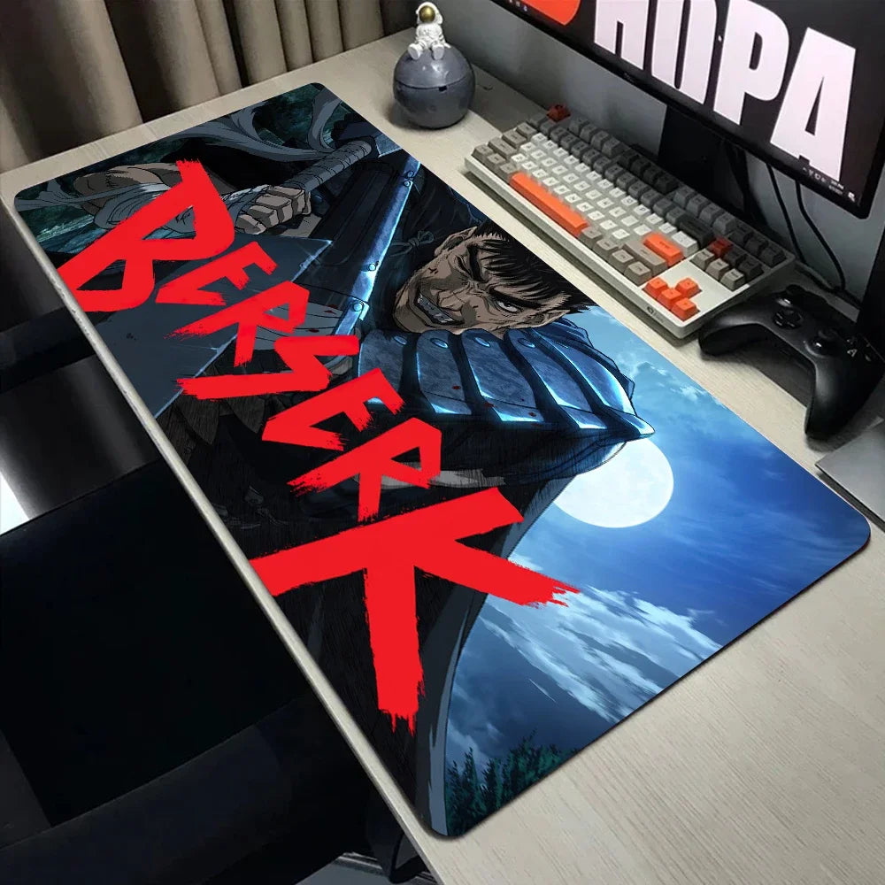 A large gaming desk mat featuring a Berserk anime design with red text and a moon, placed on a wooden desk.