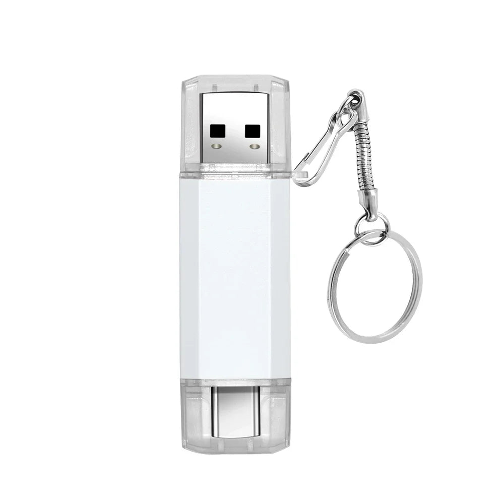 A white dual USB and Type-C flash drive with a clear plastic body and a metal keyring attachment.