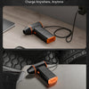 An orange and black high-power rechargeable electric air duster is shown being used for charging.