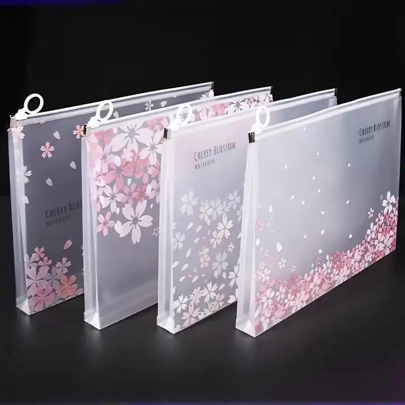 A set of transparent zipper file bags with pink cherry blossom designs for storing documents.