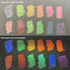 Black paper under normal light and ultraviolet light showing various fluorescent colored pencils.