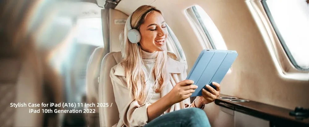 A woman is using a blue Stylish Case for iPad on her tablet inside an airplane cabin.