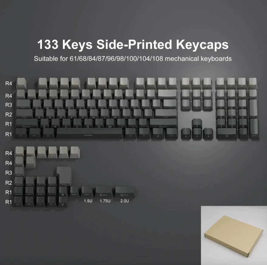 مجموعة من 133 غطاء مفاتيح (keycaps) من PBT متدرج الطباعة الجانبية لللوحات الميكانيكية معروضة على سطح رمادي داكن.