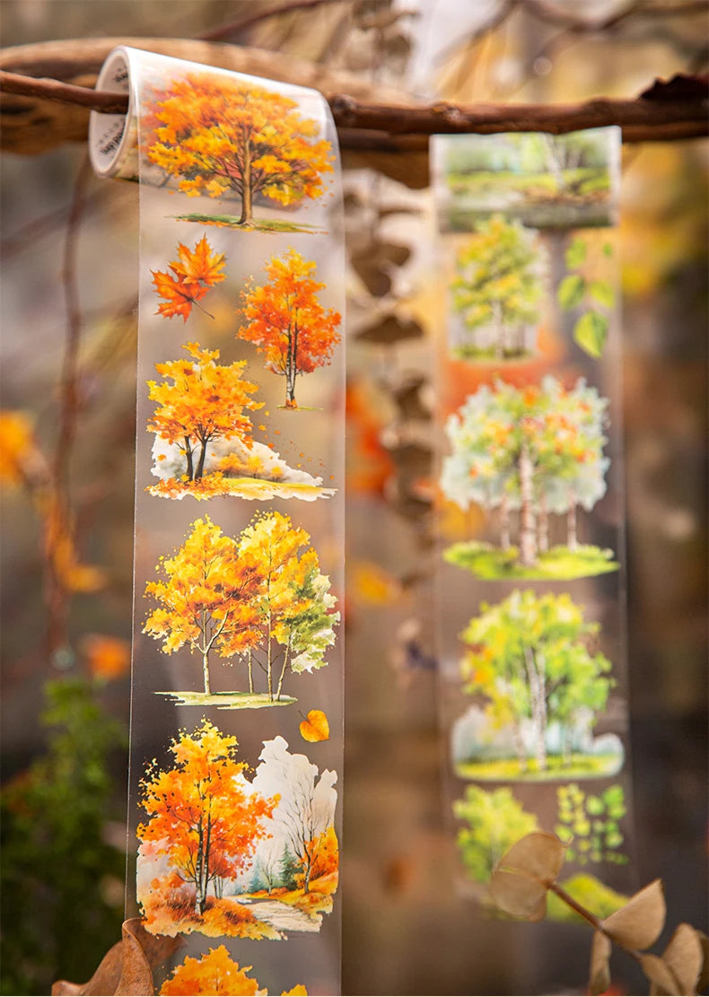Clear botanical tape featuring vibrant autumn trees and foliage for journaling and crafts