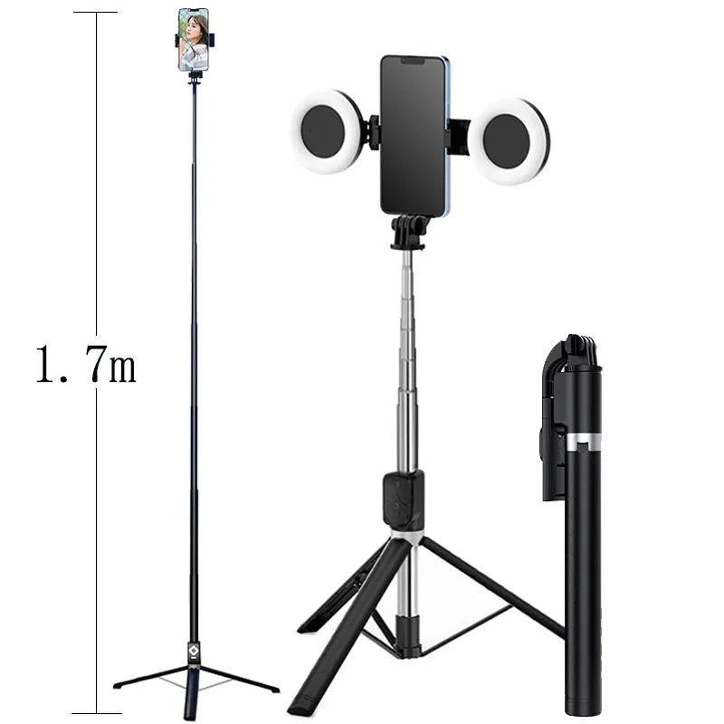 A black extendable phone tripod with an LED ring light and mirror mounted on a vertical stand.
