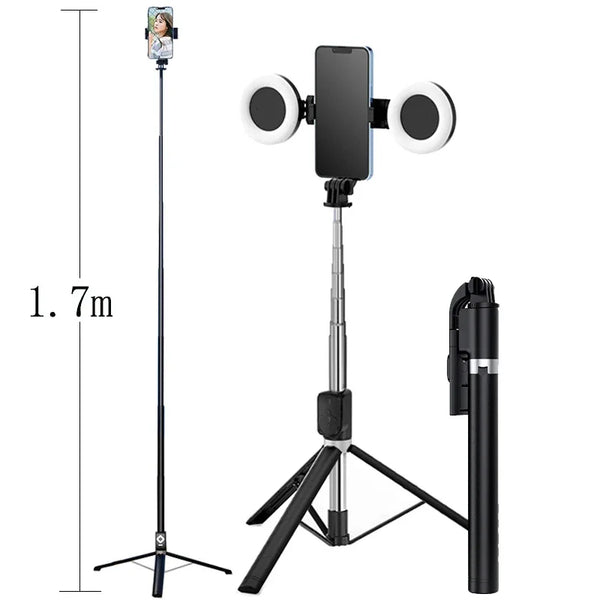 A black extendable phone tripod with an LED ring light and mirror mounted on a vertical stand.