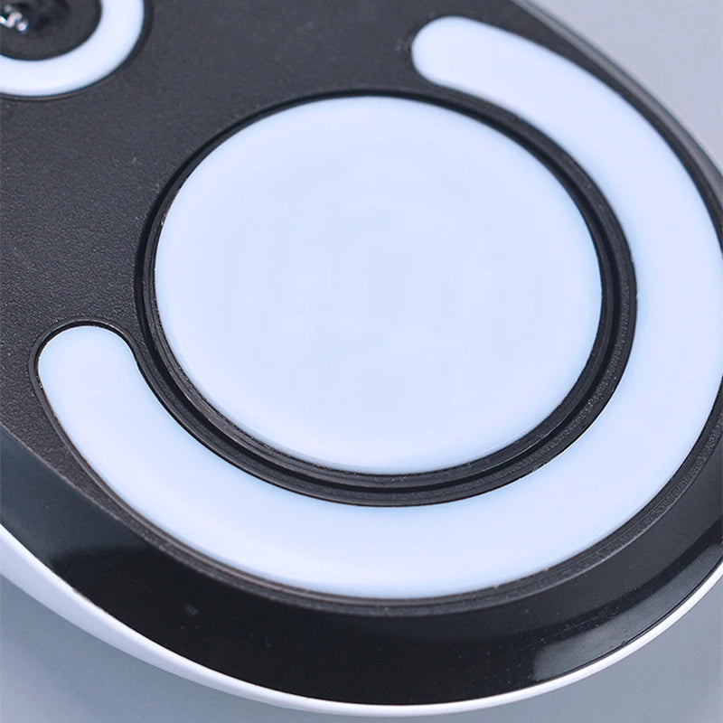 A close-up view of black and white mouse skates for Logitech G PRO Wireless gaming mouse.