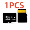 One piece of a black MicroSD memory card with a yellow chip visible.