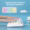 A close-up of an ergonomically designed 60% layout keyboard being used by a hand on a blue surface.