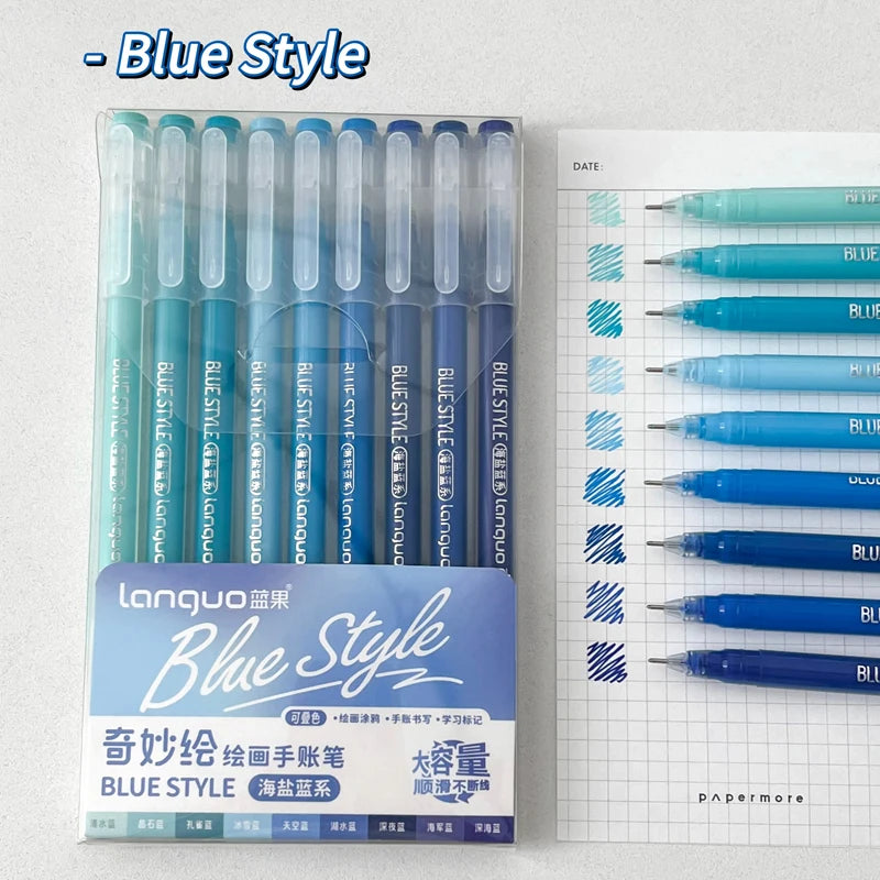 A set of nine blue style gel pens in a clear plastic case with a white label and packaging.