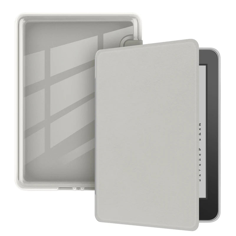 A light gray protective silicone cover for a 6-inch Kindle e-reader displayed next to its open case.