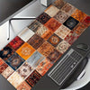 A vintage Persian rug mouse pad with a non-slip rubber base is displayed next to a laptop.