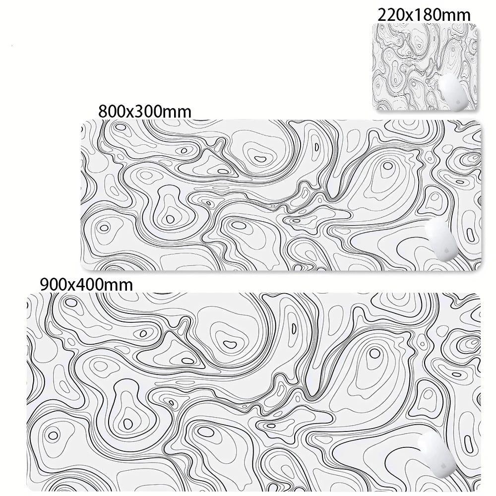 Abstract desk mat featuring swirling line patterns in black and white for gaming and office use