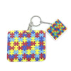 Buntes Puzzle-Teil-Anhänger-Schlüsselring mit lebendigem Patchwork-Design.