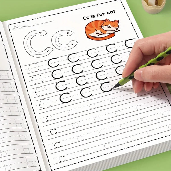 A hand writes the letter Cc in an alphabet practice book for children, featuring a cat illustration.
