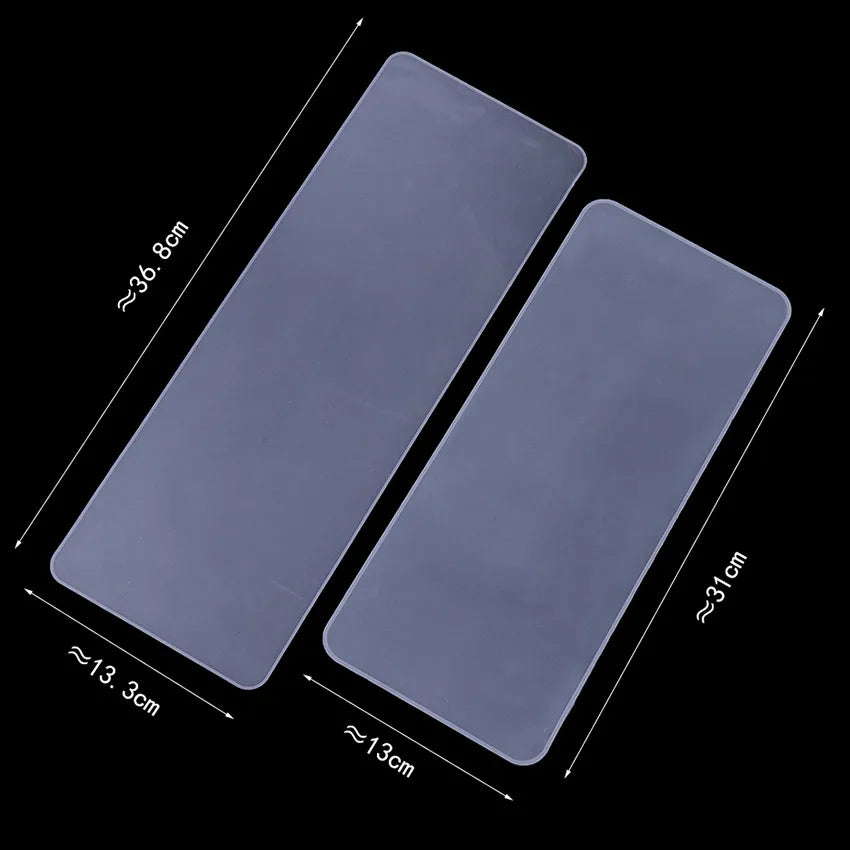Housse de clavier pour ordinateur portable en silicone translucide, dimensions 36,8 cm x 13,3 cm.