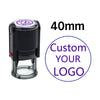 A black self-inking stamp with a clear base and a purple circle indicating 40mm size.