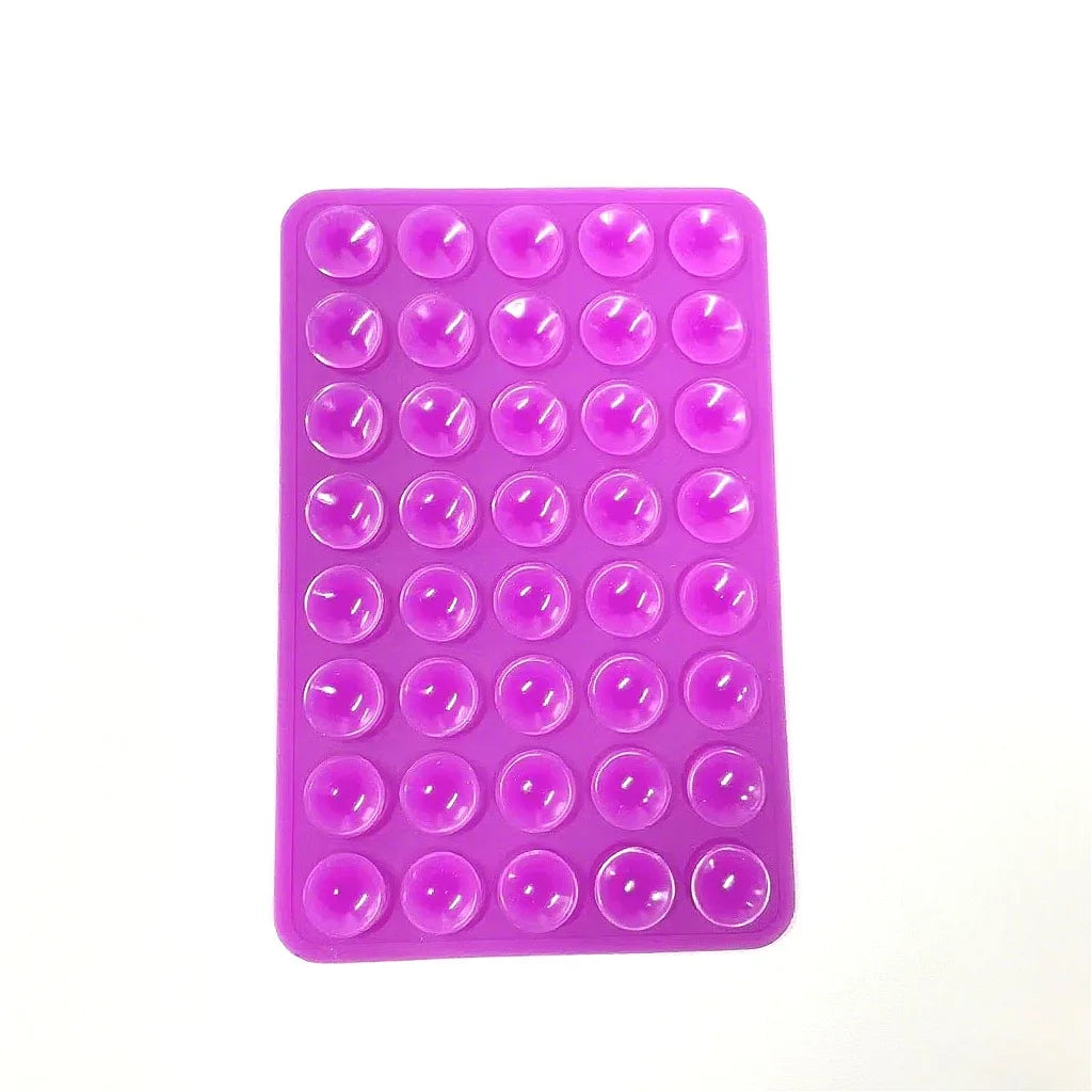 A purple silicone phone mount grip with multiple hemispherical silicone grips.