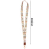 A vertical view of a beige patterned fashion lanyard strap with a metal clip.