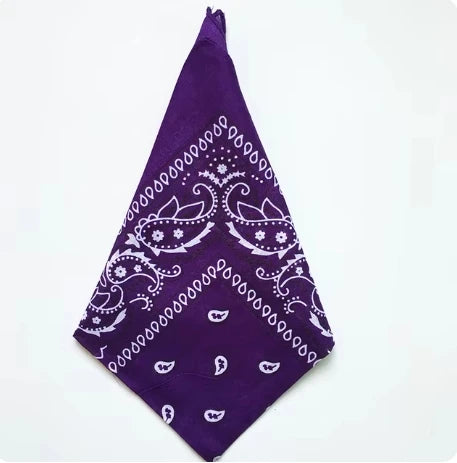 Purple cotton bandana square scarf with white paisley print folded diagonally