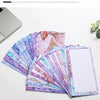 A stack of beautifully patterned A6 budget planner binders with envelope pockets and expense sheets