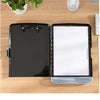 A black A4 waterproof file box with a writing board and pen slot is shown on a wooden table.