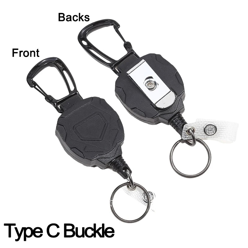 A black retractable badge clip with a silver buckle and attached rings, shown from the front and back.