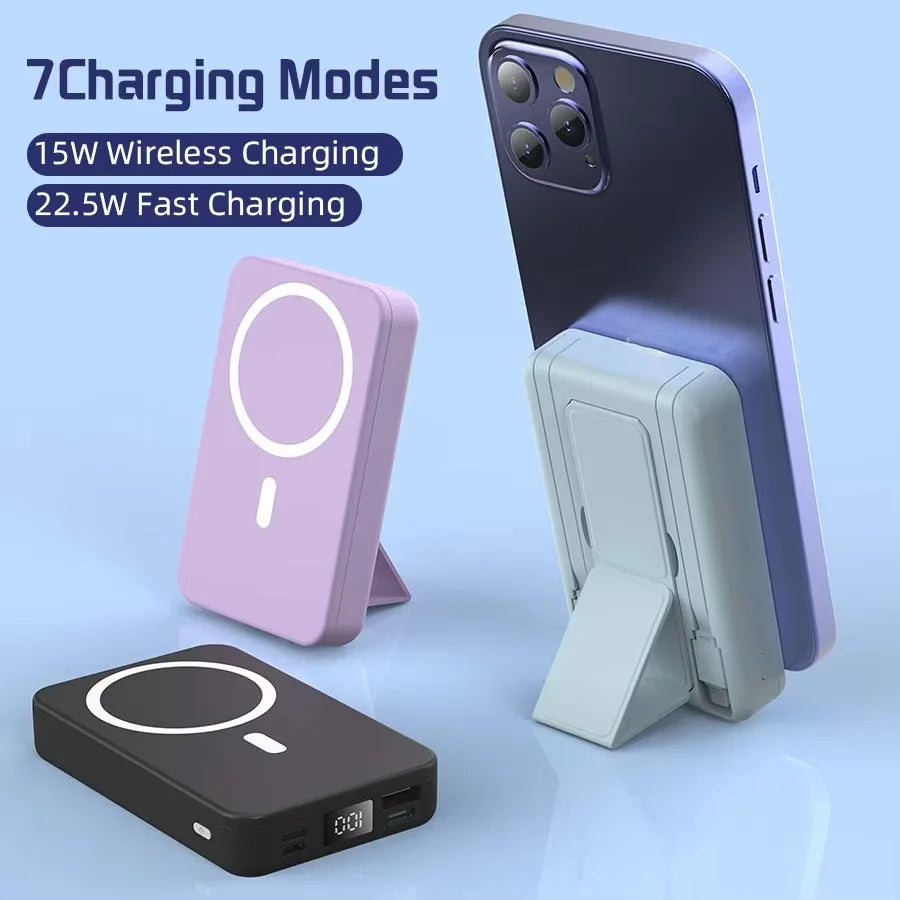 A purple smartphone is shown next to a pink magnetic wireless charging pad and a black power bank.