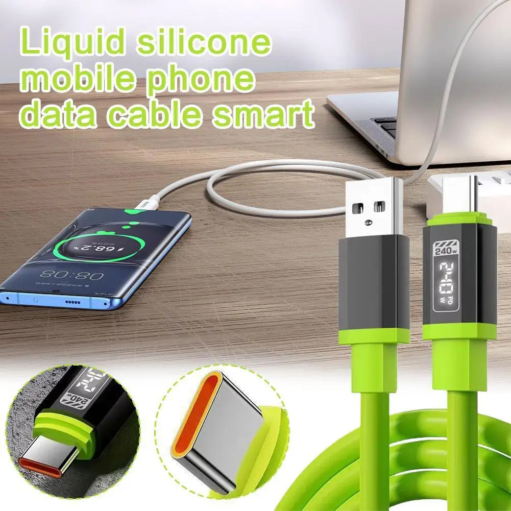 Flüssiges Silikon-Mobiltelefon-Datenkabel und Ladegerät mit grünen und schwarzen Komponenten auf einem Holzschreibtisch.