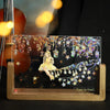 A decorative PET washi tape roll featuring a golden-hued scene with stars and foliage.