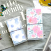 A clear PVC cover for a standard travelers notebook featuring a floral pattern on the inside.