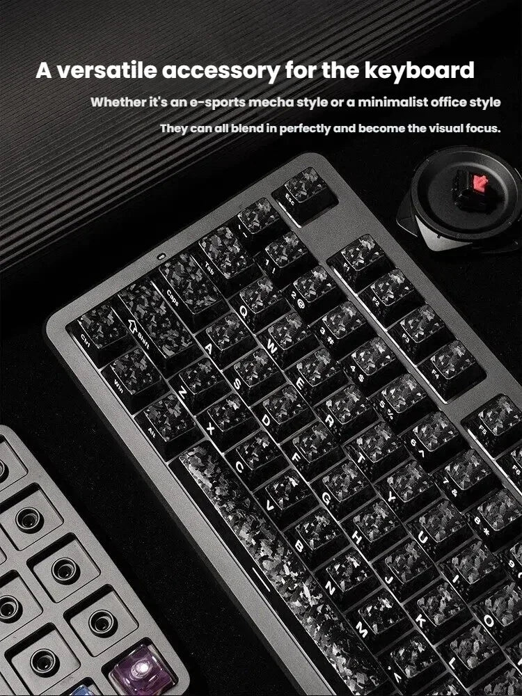 Close-up view of carbon fiber texture keycaps for MX mechanical keyboards with a separate accessory visible.