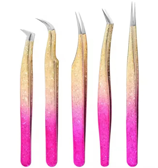 Precision eyelash extension tweezers with a gradient finish in pink and gold.