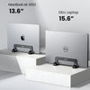 A comparison of a MacBook Air 2022 and a Dell laptop displayed on vertical stands.
